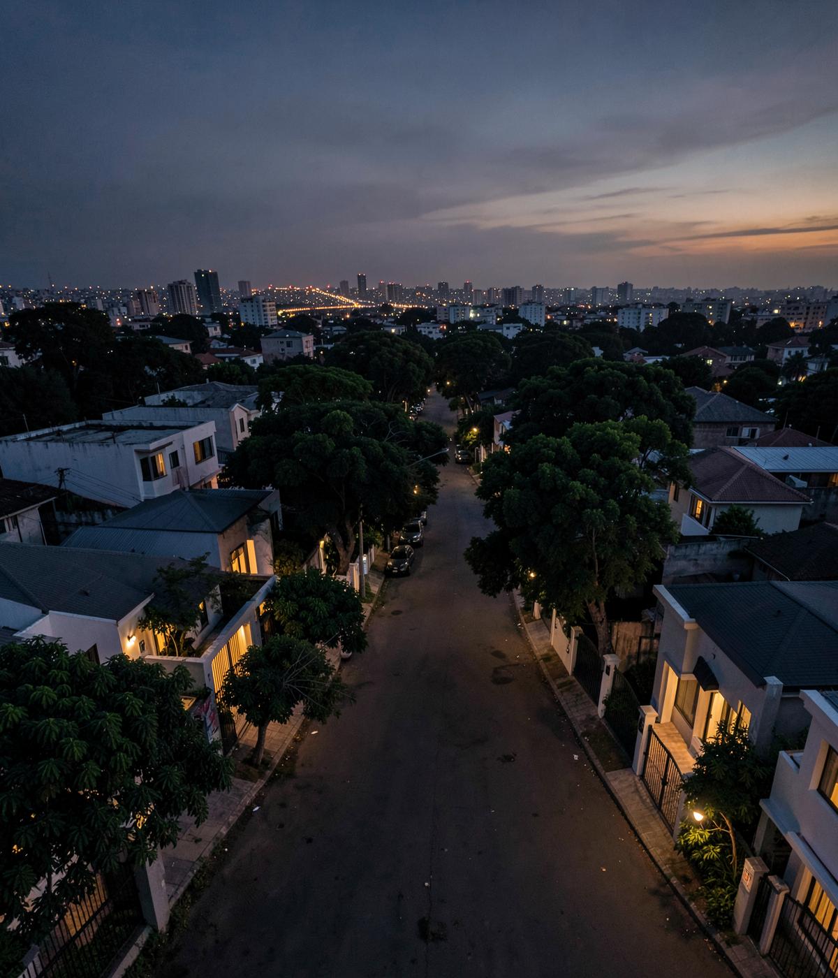 Aerial twilight view of a tree-lined Accra neighbourhood